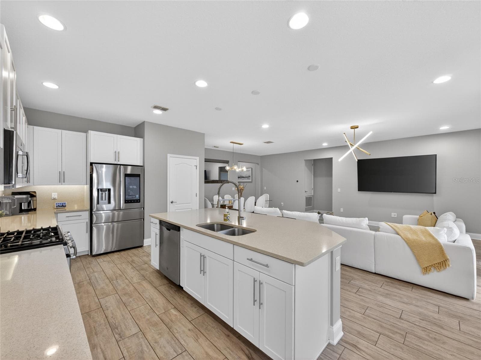 Kitchen Features Include Solid Surface Counters and Stainless Steel Appliances - 11209 LEMON LAKE BLVD, ORLANDO