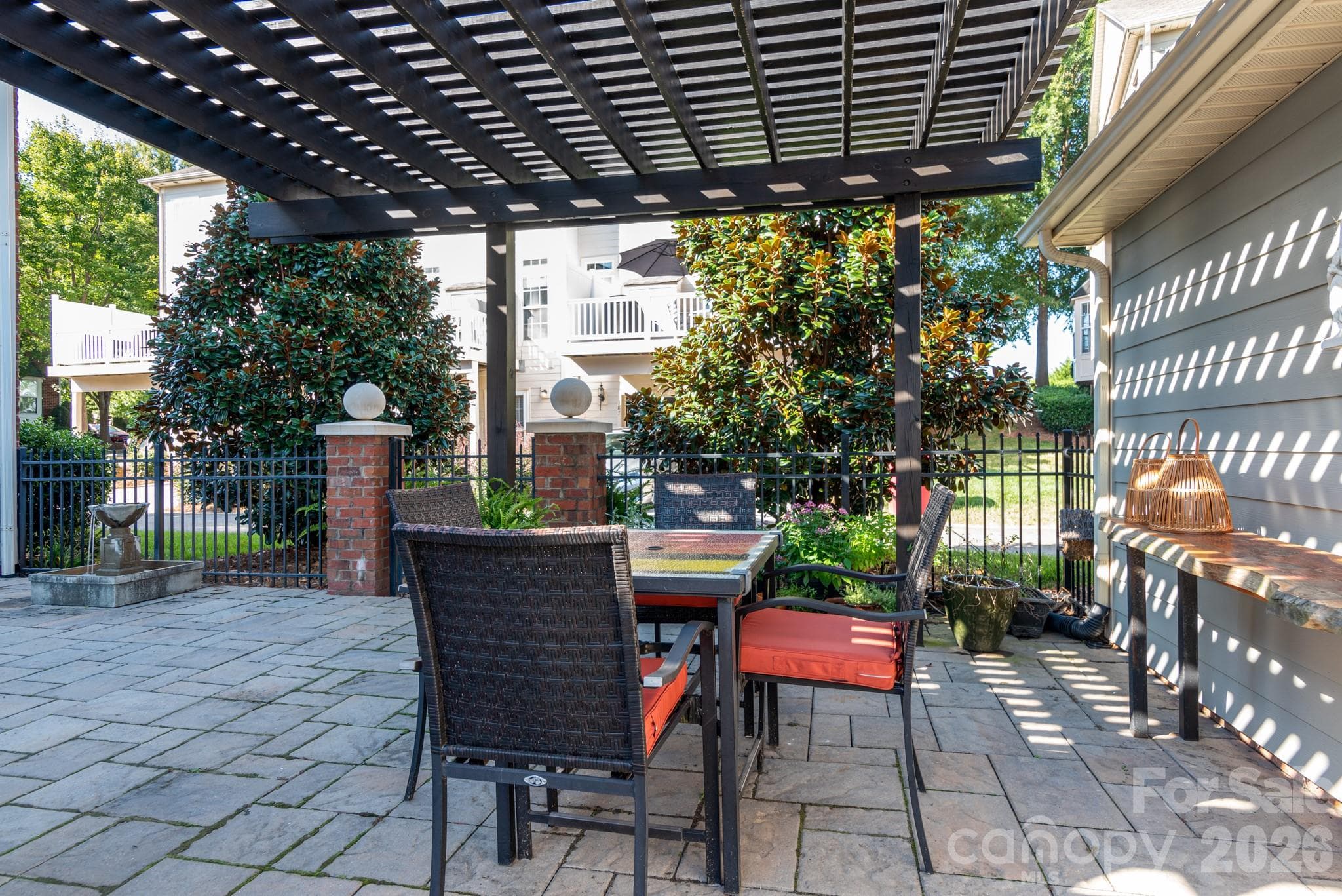 Side yard with beautiful Magnolia trees for privacy - Davidson