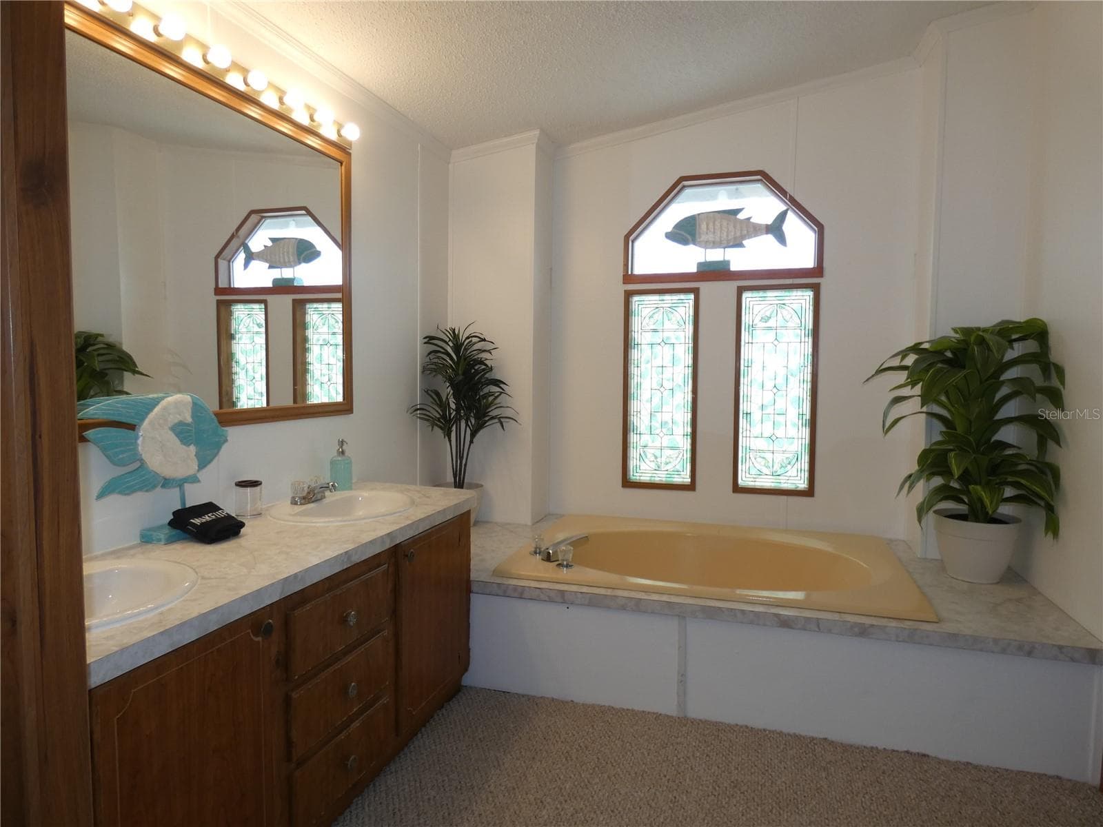 Primary bedroom with primary bathroom. - 6814 GULL LN, HUDSON