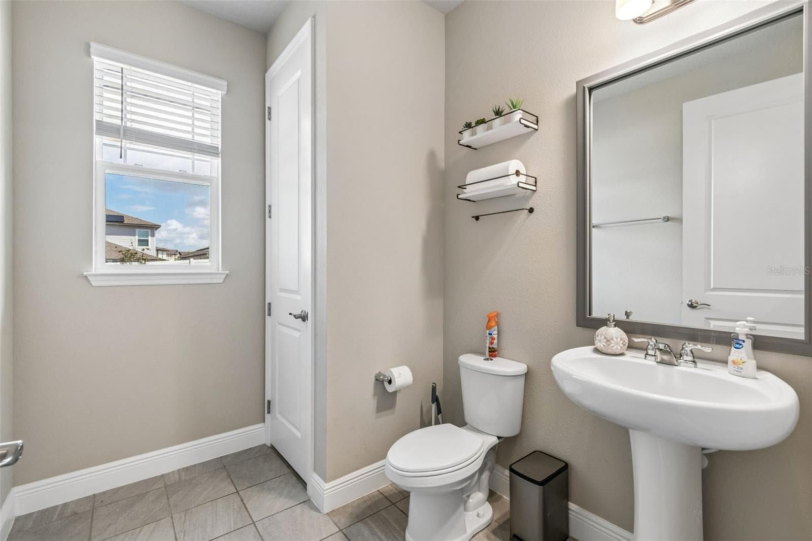 1/2 bath downstairs - 2310 RAVEN RIDGE RD, MINNEOLA
