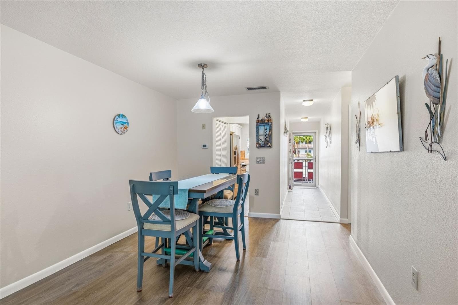 Open dining and living layout - 5521 80TH ST N #212, ST PETERSBURG