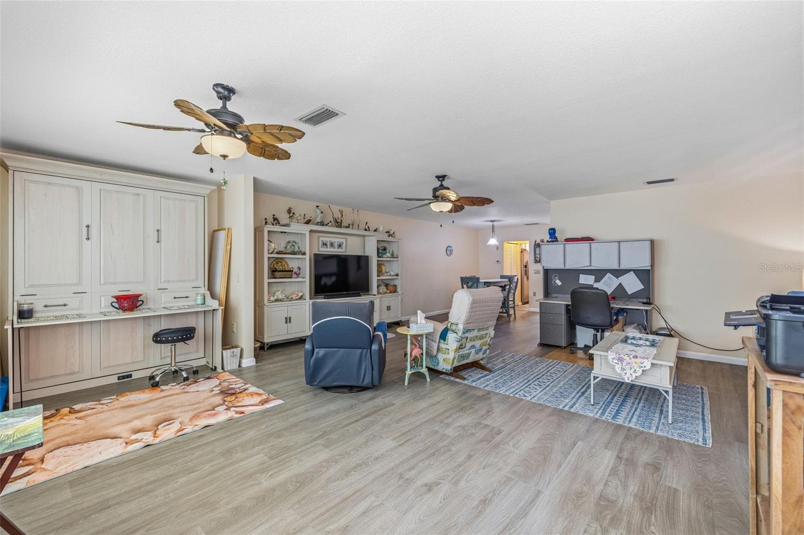 Main living area with open flow - 5521 80TH ST N #212, ST PETERSBURG