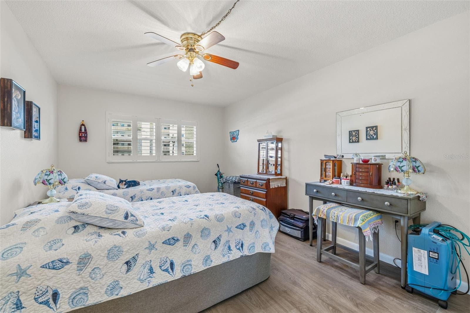Primary bedroom with natural light - 5521 80TH ST N #212, ST PETERSBURG