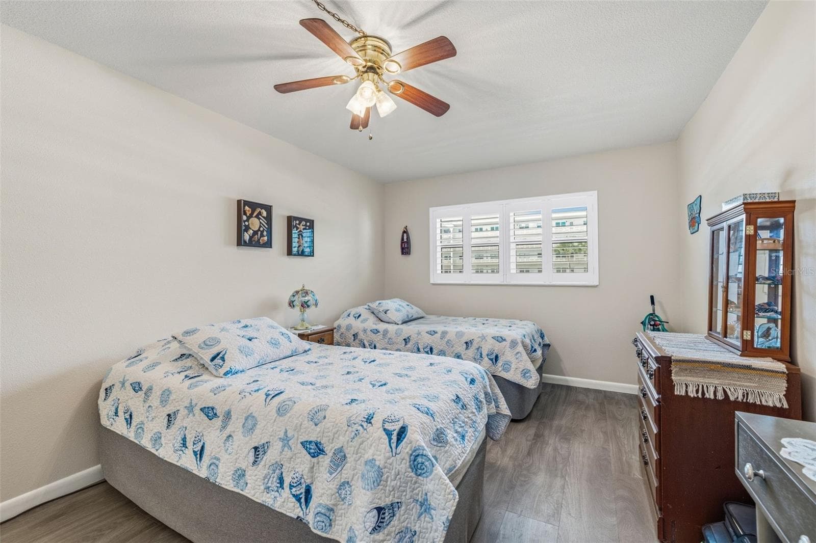 Primary bedroom with ample space and storage - 5521 80TH ST N #212, ST PETERSBURG