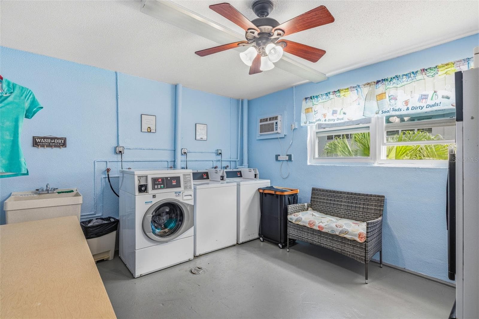Community laundry room with washer and dryer - 5521 80TH ST N #212, ST PETERSBURG
