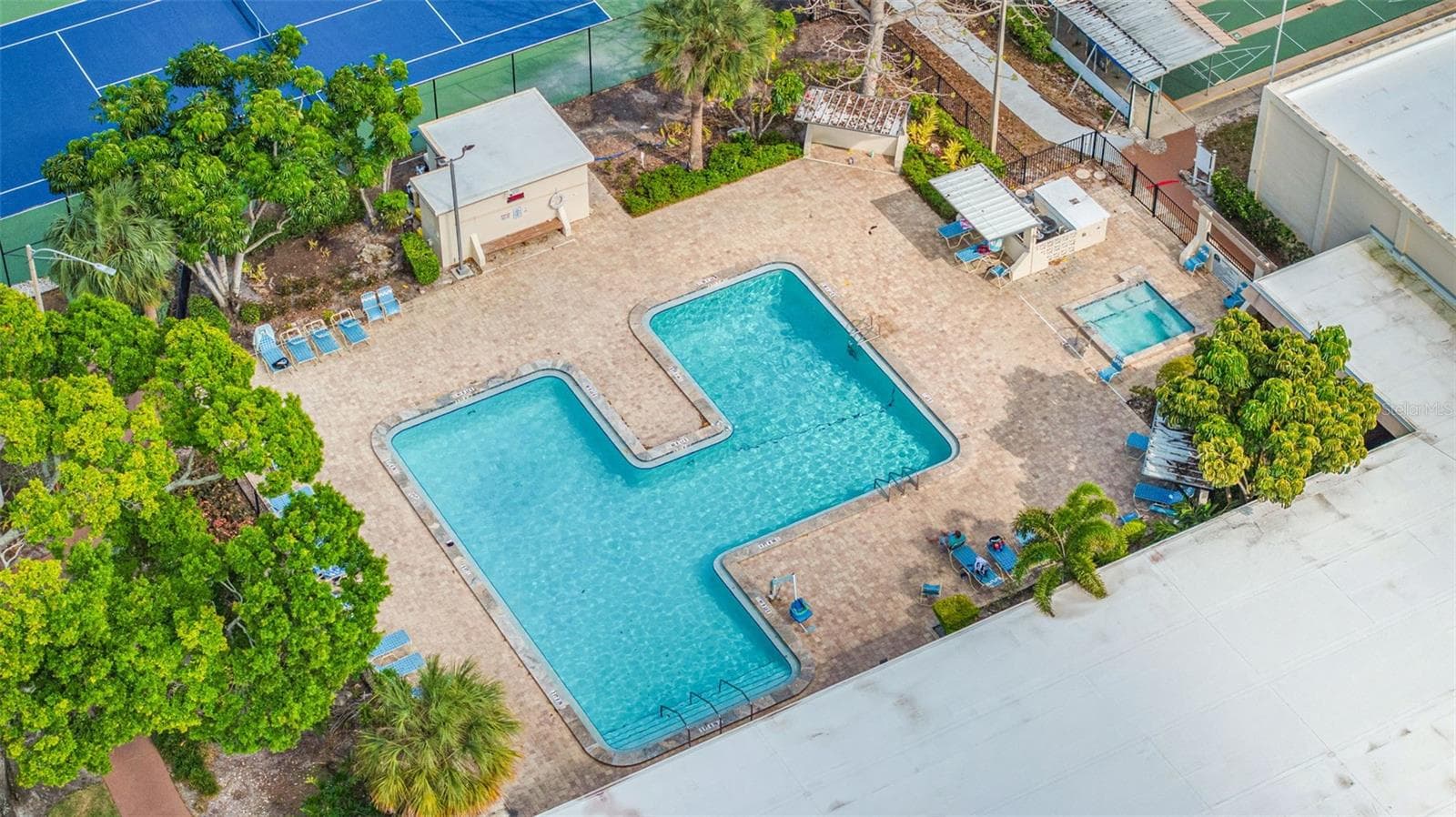 Aerial view of pool and community amenities - 5521 80TH ST N #212, ST PETERSBURG