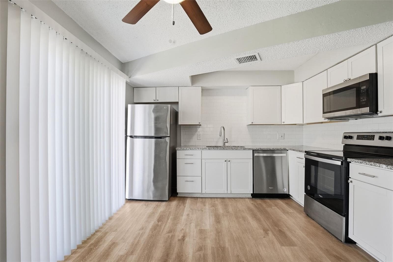 Single Family Residence at 728 E SPRUCE ST, TARPON SPRINGS, photo 13 of 35
