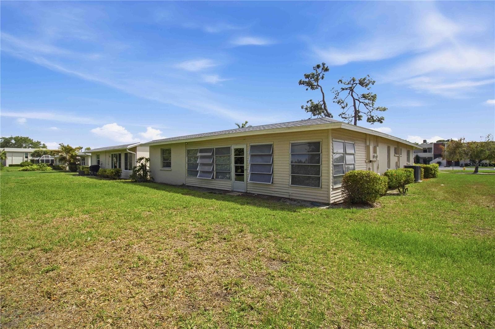 back of villa - 7354 W COUNTRY CLUB DR N, SARASOTA