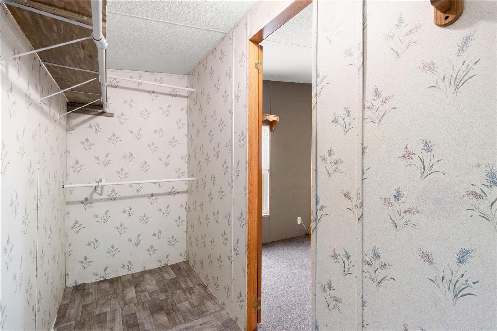 Primary walk in closet - 1371 NW 12TH LN, LAKE PANASOFFKEE