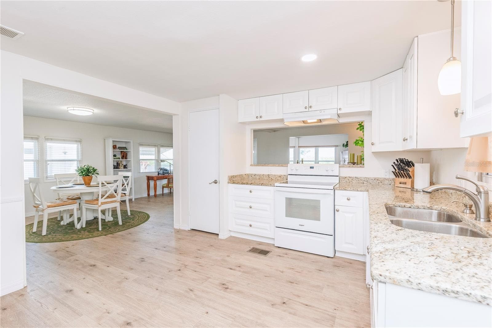 Kitchen is open to the dining room. - 4851 W GANDY BLVD #23C, TAMPA