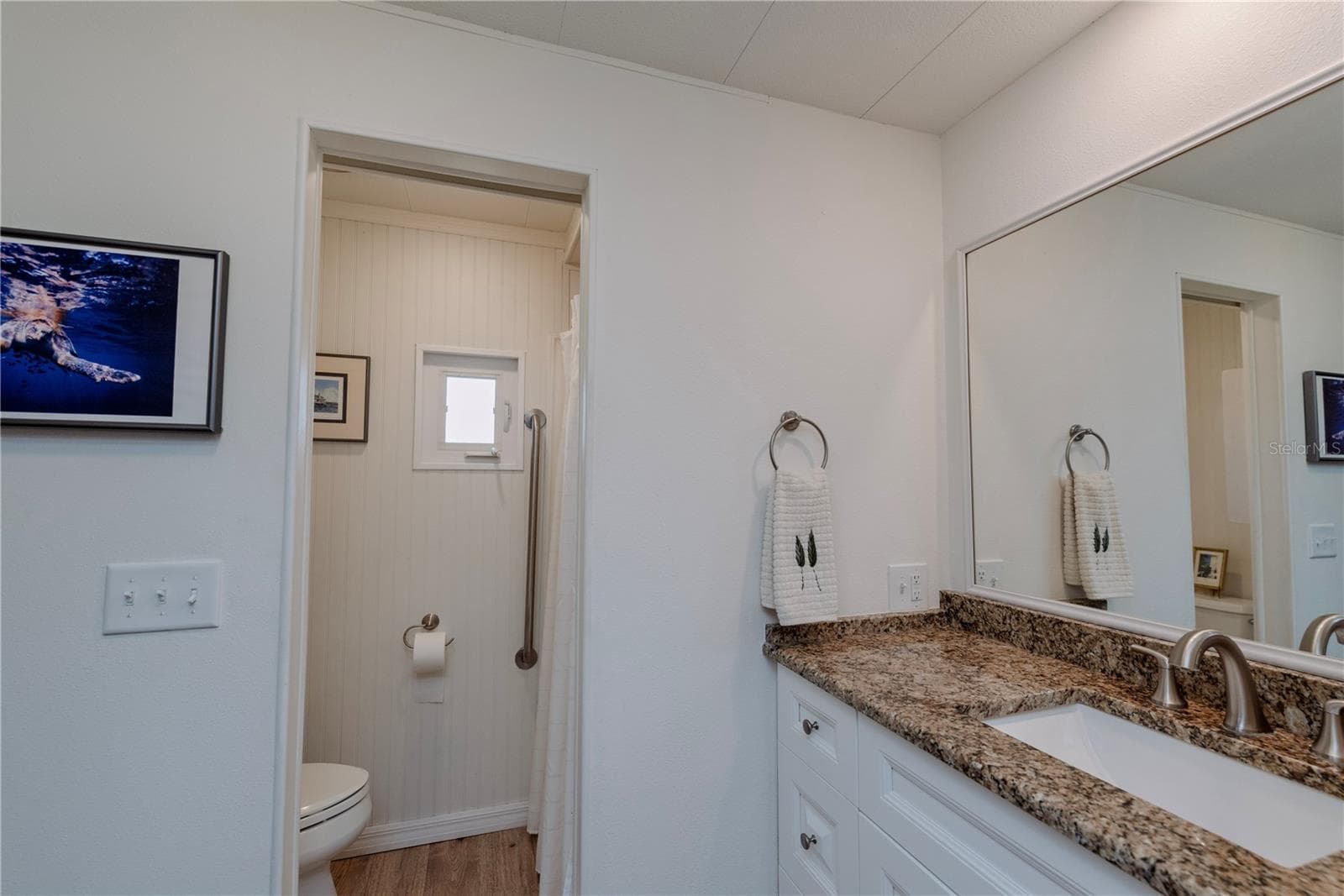 Primary bathroom with separate shower area. - 4851 W GANDY BLVD #23C, TAMPA