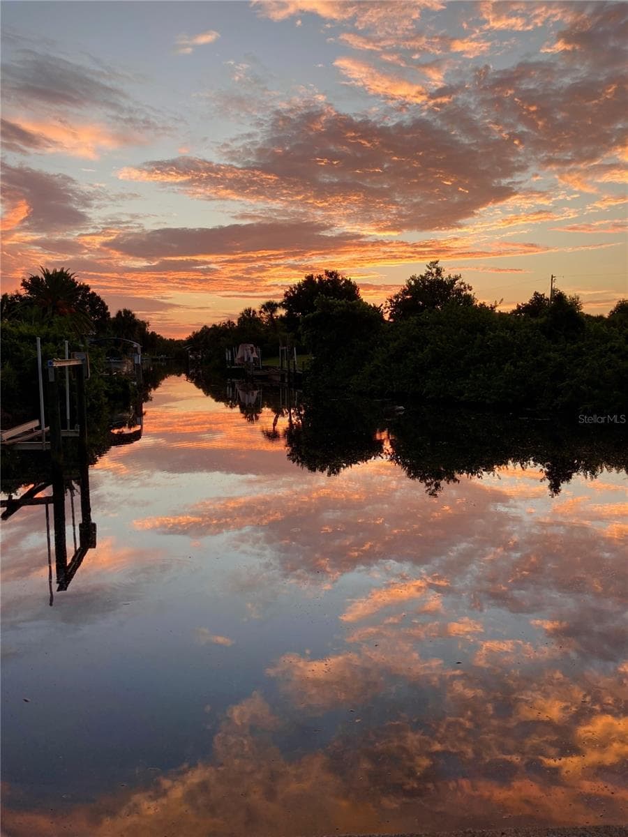 Sunrise on the waterway Photo kindly provided by owner - 2076 RIVER BASIN TER, PUNTA GORDA