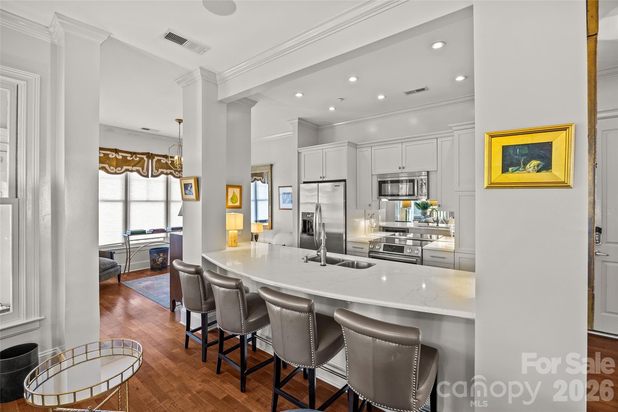 Renovated kitchen with stainless steel applinaces and kitchen island with seating - SouthGate on Fairview, Charlotte