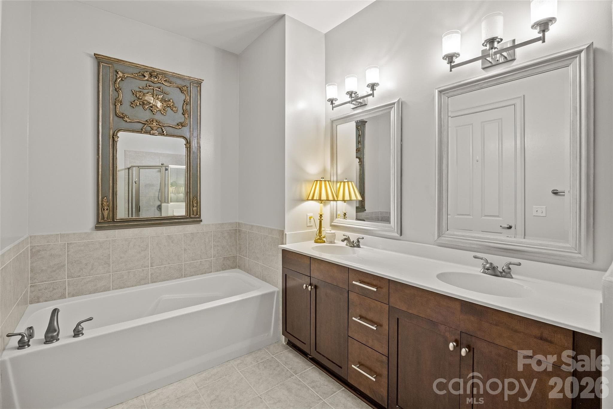Primary bathroom with double vanity, shower and bathtub - SouthGate on Fairview, Charlotte