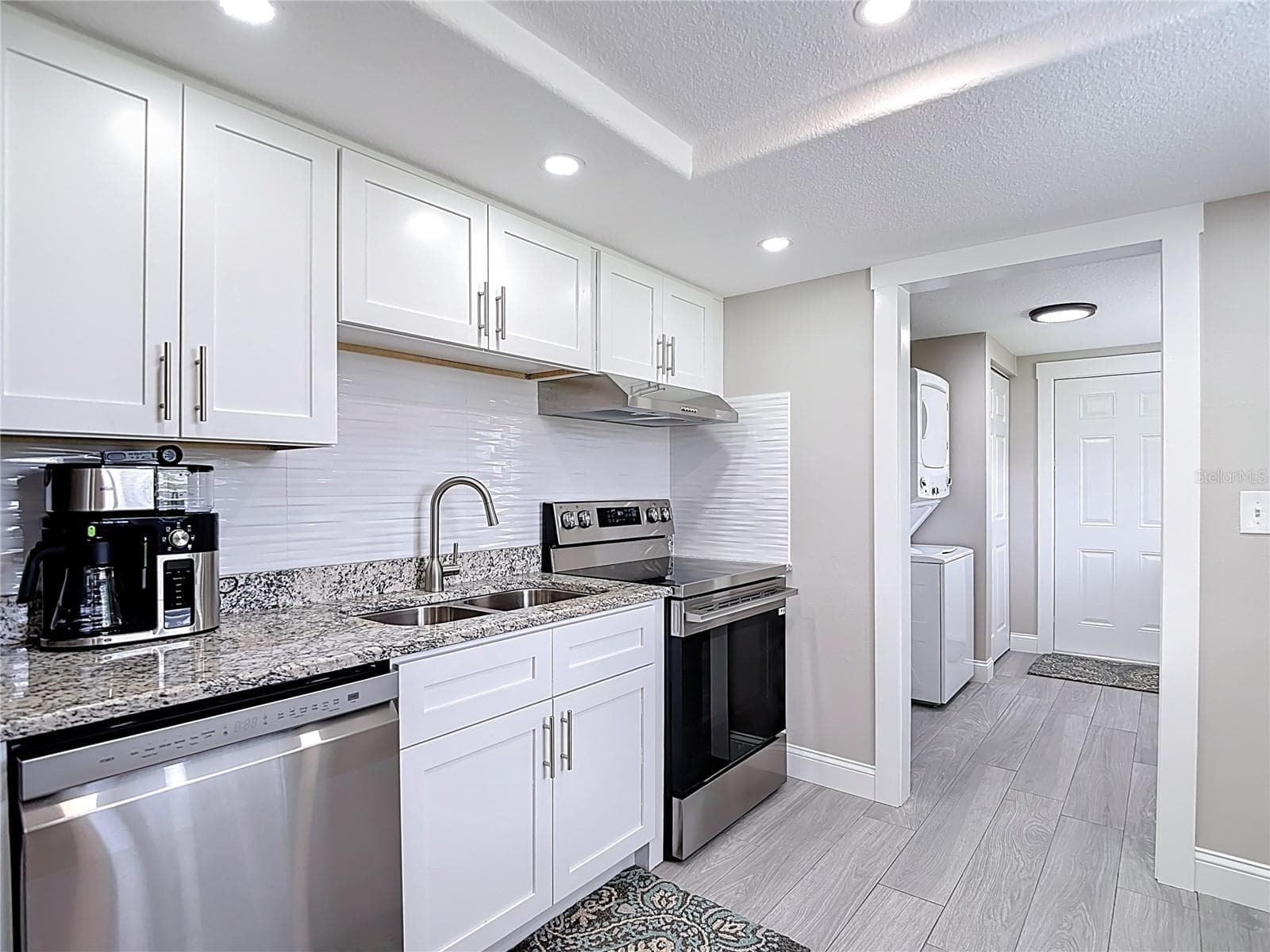 Solid wood cabinets and Stone Counter Tops! - 14306 GUAVA STREET, HUDSON