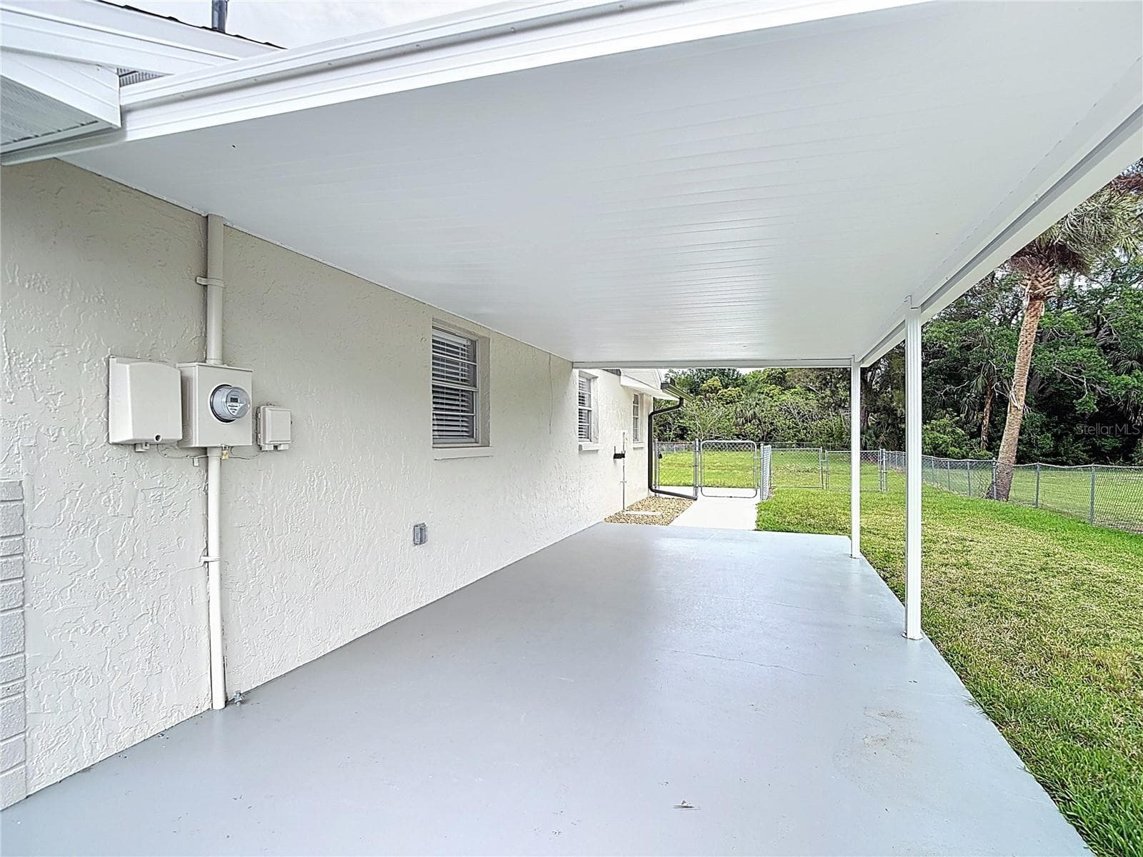 Huge carport and fenced in backyard for your doggies! - 14306 GUAVA STREET, HUDSON