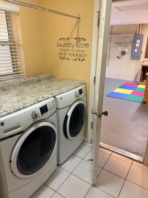 Laundry room with washer, dryer, counter space, and natural light in The Villages Florida home - 110 CHULA VISTA AVE, LADY LAKE