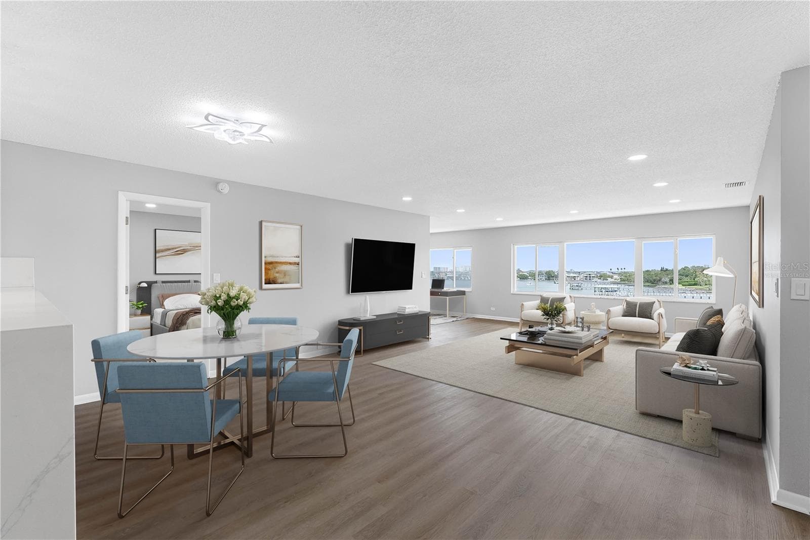 Dining/Living Room Virtually Staged - 100 BLUFF VIEW DR #404C, BELLEAIR BLUFFS