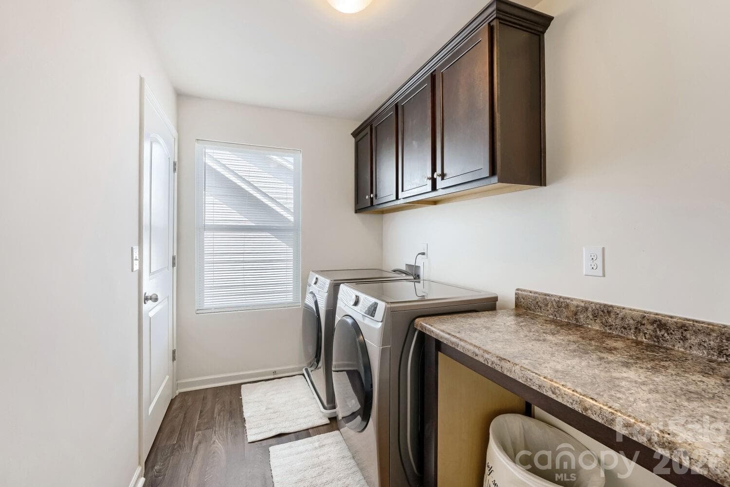 Spacious laundry with great storage - 7004 Duncan Acres Drive, Belmont