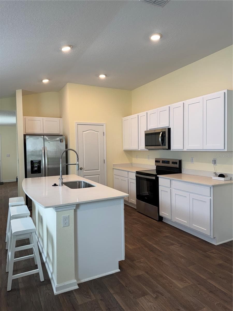 Kitchen with stainless appliances. - 203 CHESTERWOOD RD, ST AUGUSTINE