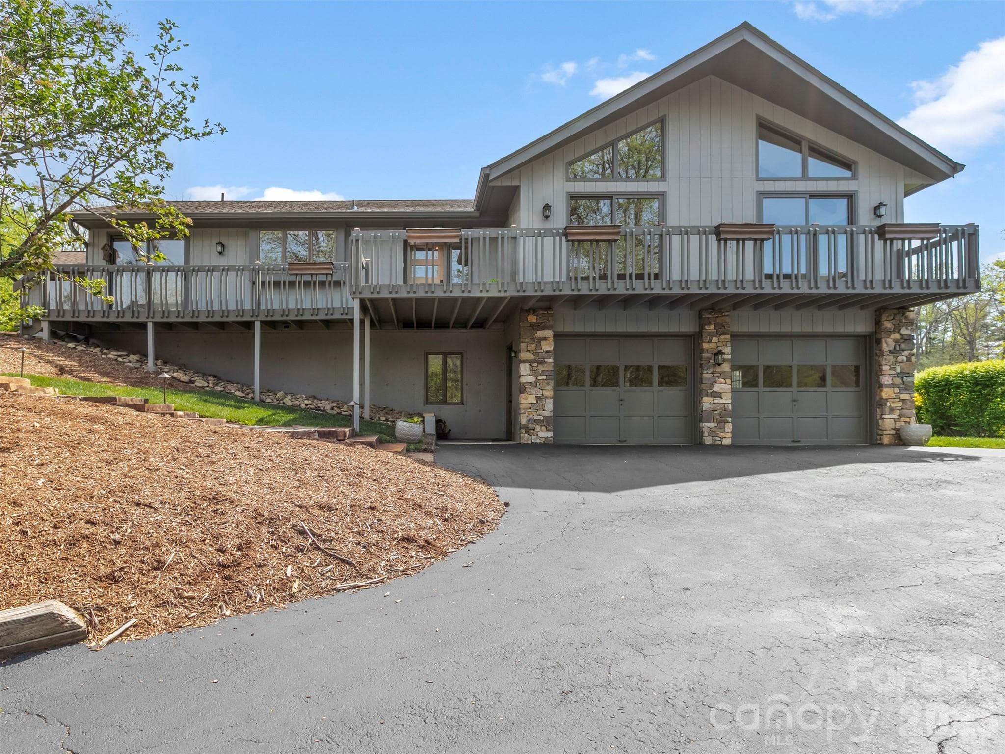 Beautifully updated home in a quaint yet convenient location, blending mountain charm, timeless comfort, and a versatile floor plan! - 2731 Miller Lane, Hendersonville