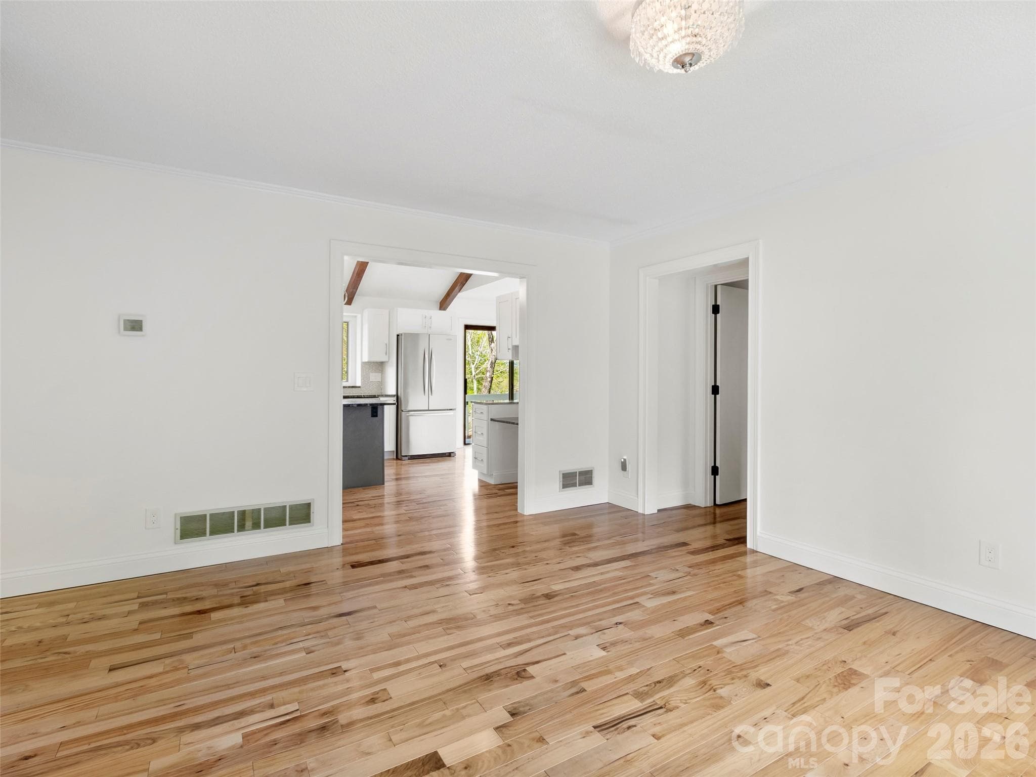 The dining room is conveniently located just off the kitchen, making everyday meals and entertaining effortless. - 2731 Miller Lane, Hendersonville