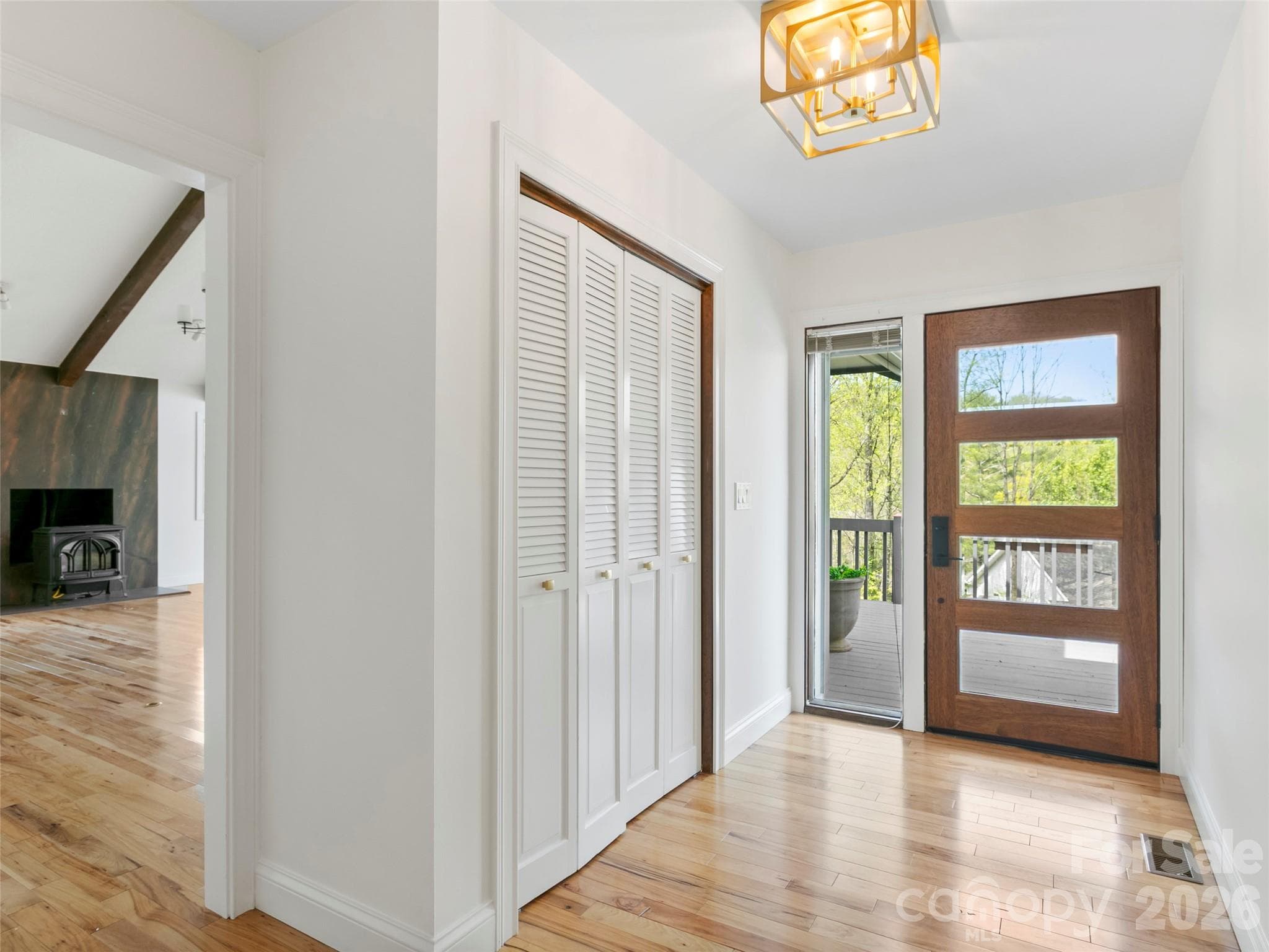 Enter through the main foyer, where convenient access to the Great Room creates an effortless connection between spaces. - 2731 Miller Lane, Hendersonville