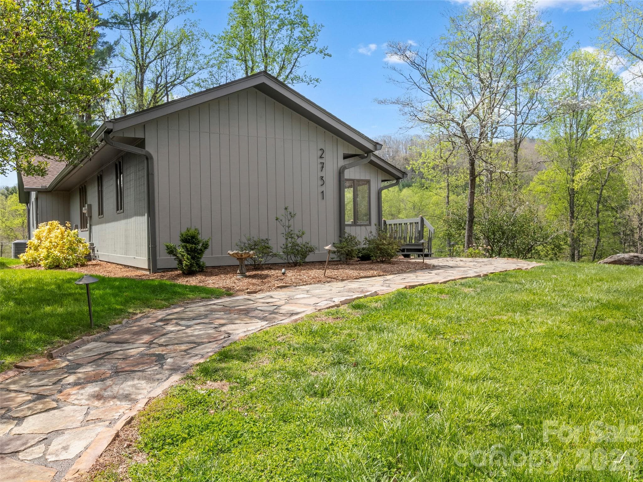 Stone path from street level leading to main level deck and front door. - 2731 Miller Lane, Hendersonville