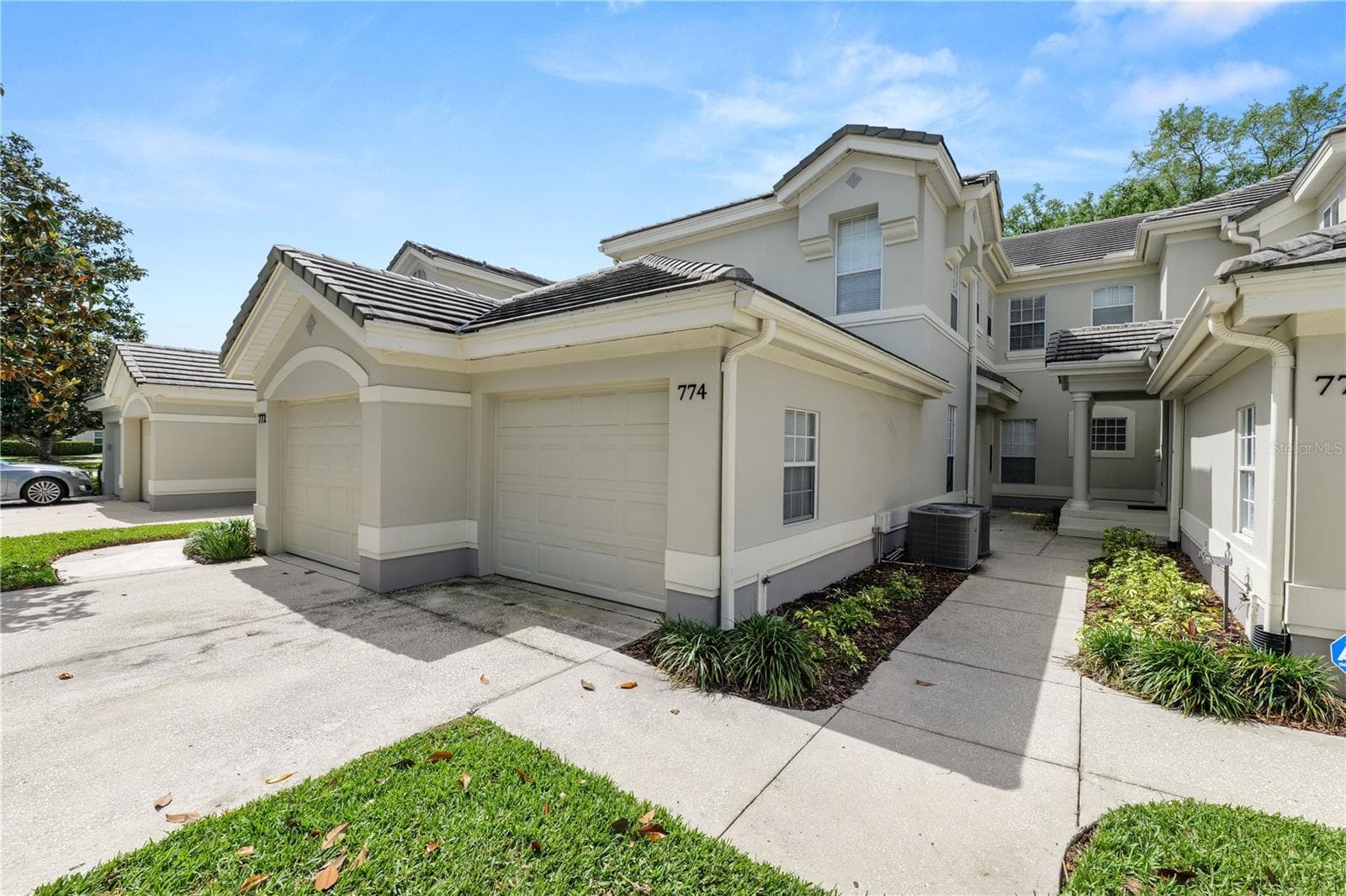 Condominium at 774 GRASSLANDS VILLAGE CIR #88, LAKELAND, photo 2 of 54