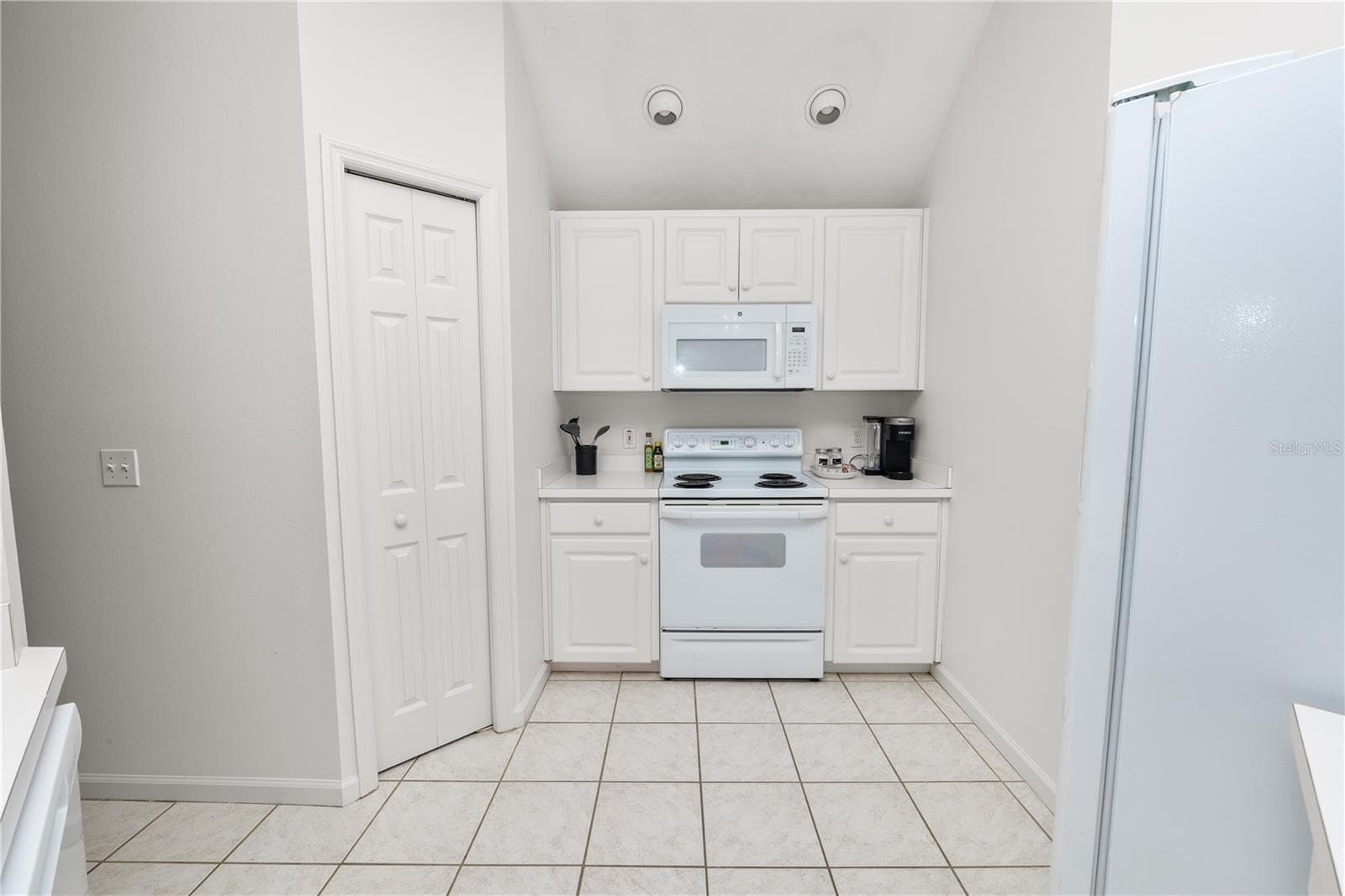 Condominium at 774 GRASSLANDS VILLAGE CIR #88, LAKELAND, photo 13 of 54