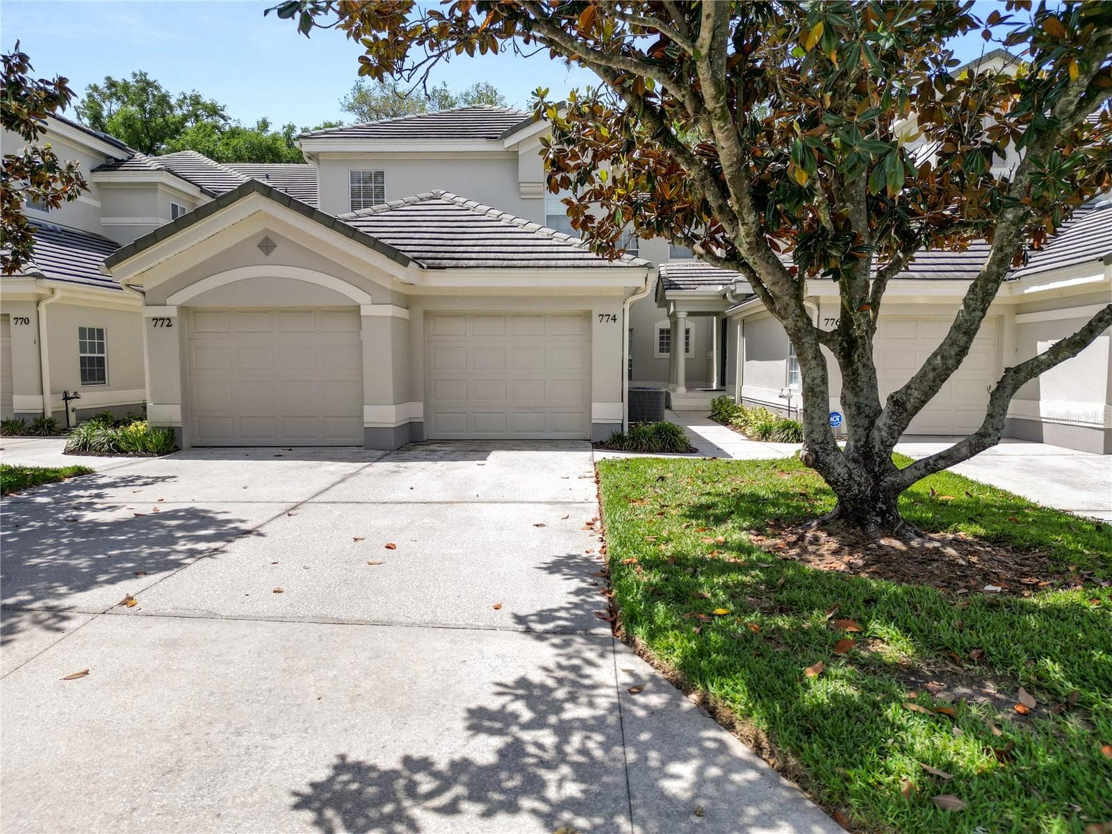 Condominium at 774 GRASSLANDS VILLAGE CIR #88, LAKELAND, photo 52 of 54