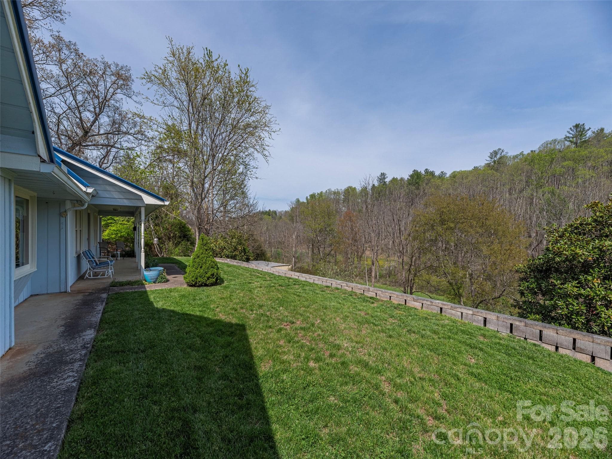 Gently sloping front yard that leads to the barn below left. - 444 Martin Branch Road, Leicester