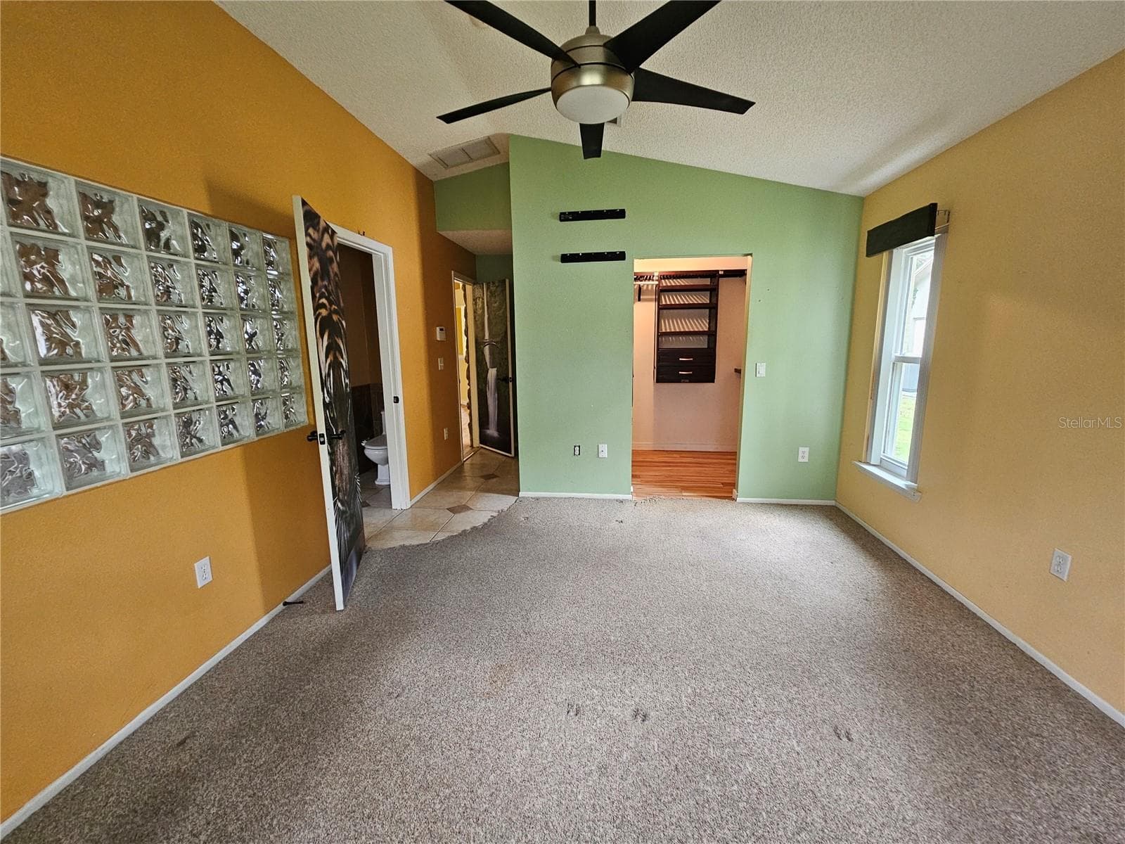 Primary Bedroom with walk-in closet - 1795 BAYHILL DR, OLDSMAR