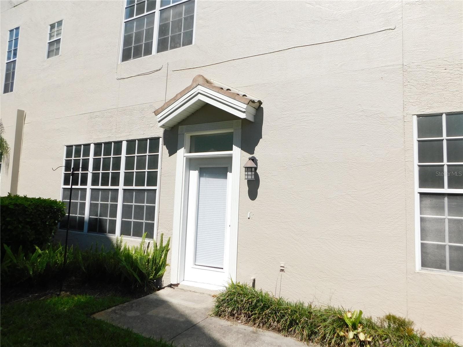 Side door entry - 1720 ARABIAN LN, PALM HARBOR