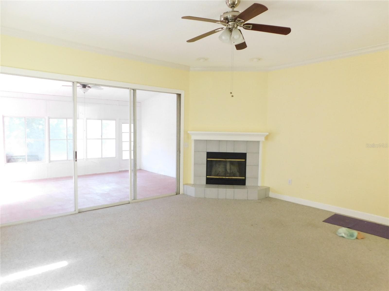 Family Room with sliders to open up to the huge Florida room - 1720 ARABIAN LN, PALM HARBOR