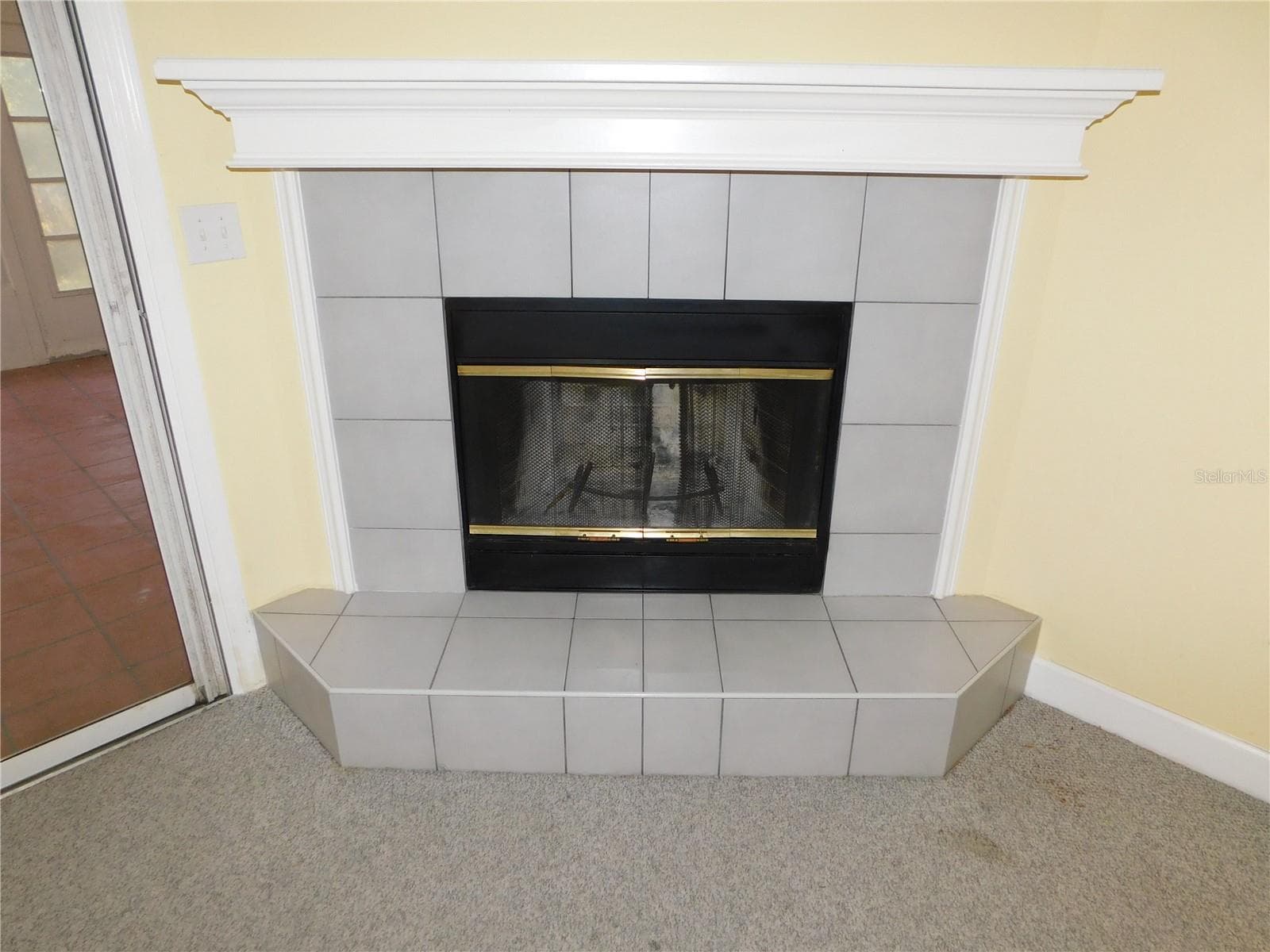 Wood burning fireplace in Family room - 1720 ARABIAN LN, PALM HARBOR