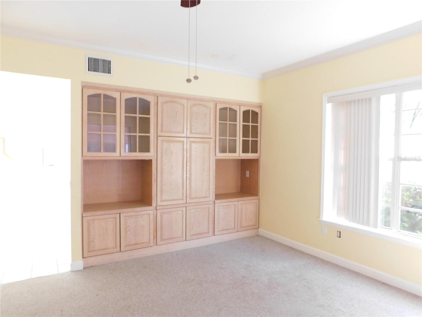 Built in cabinets in Family room - 1720 ARABIAN LN, PALM HARBOR