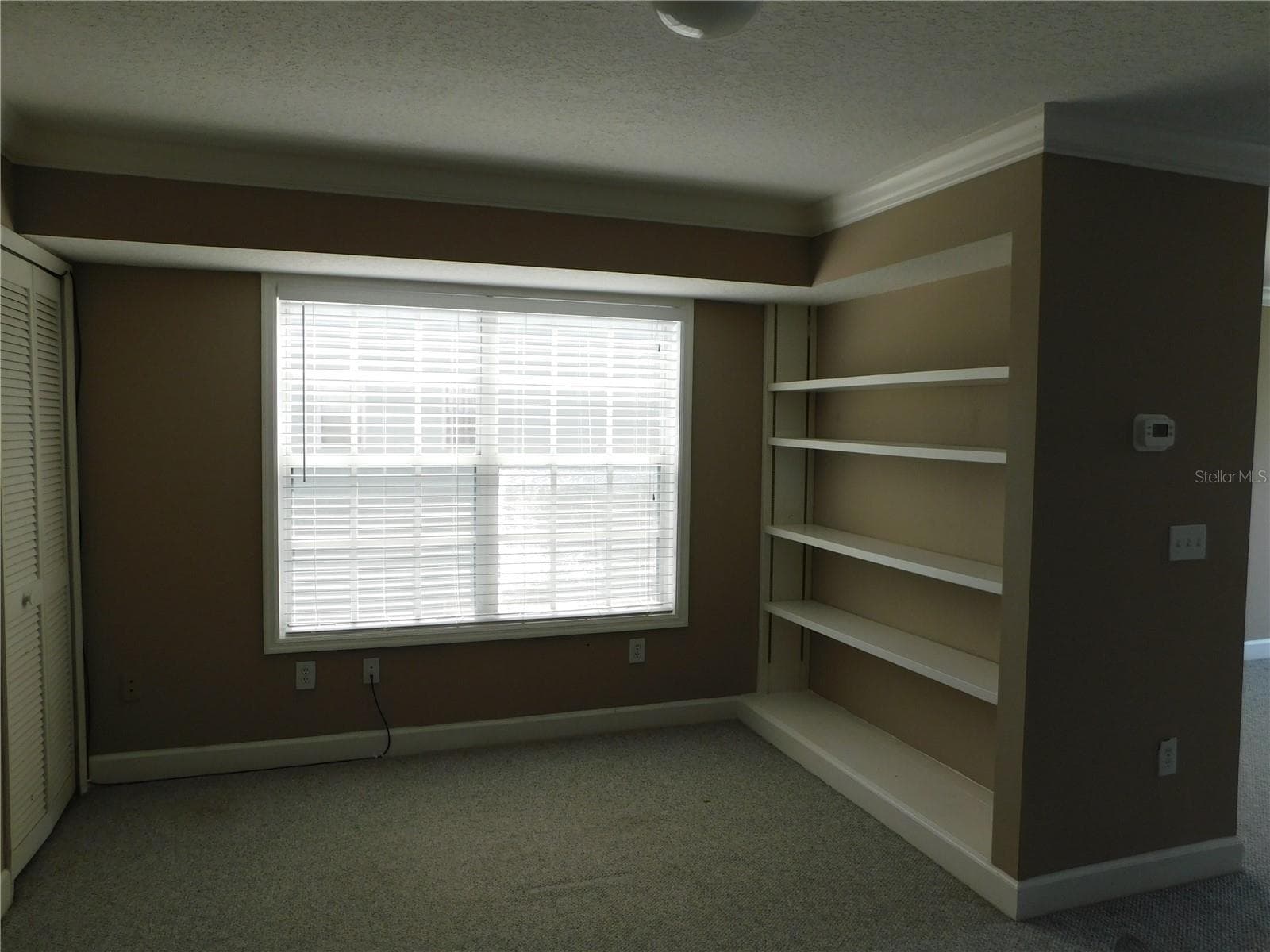 Nice sitting area in Primary suite - 1720 ARABIAN LN, PALM HARBOR
