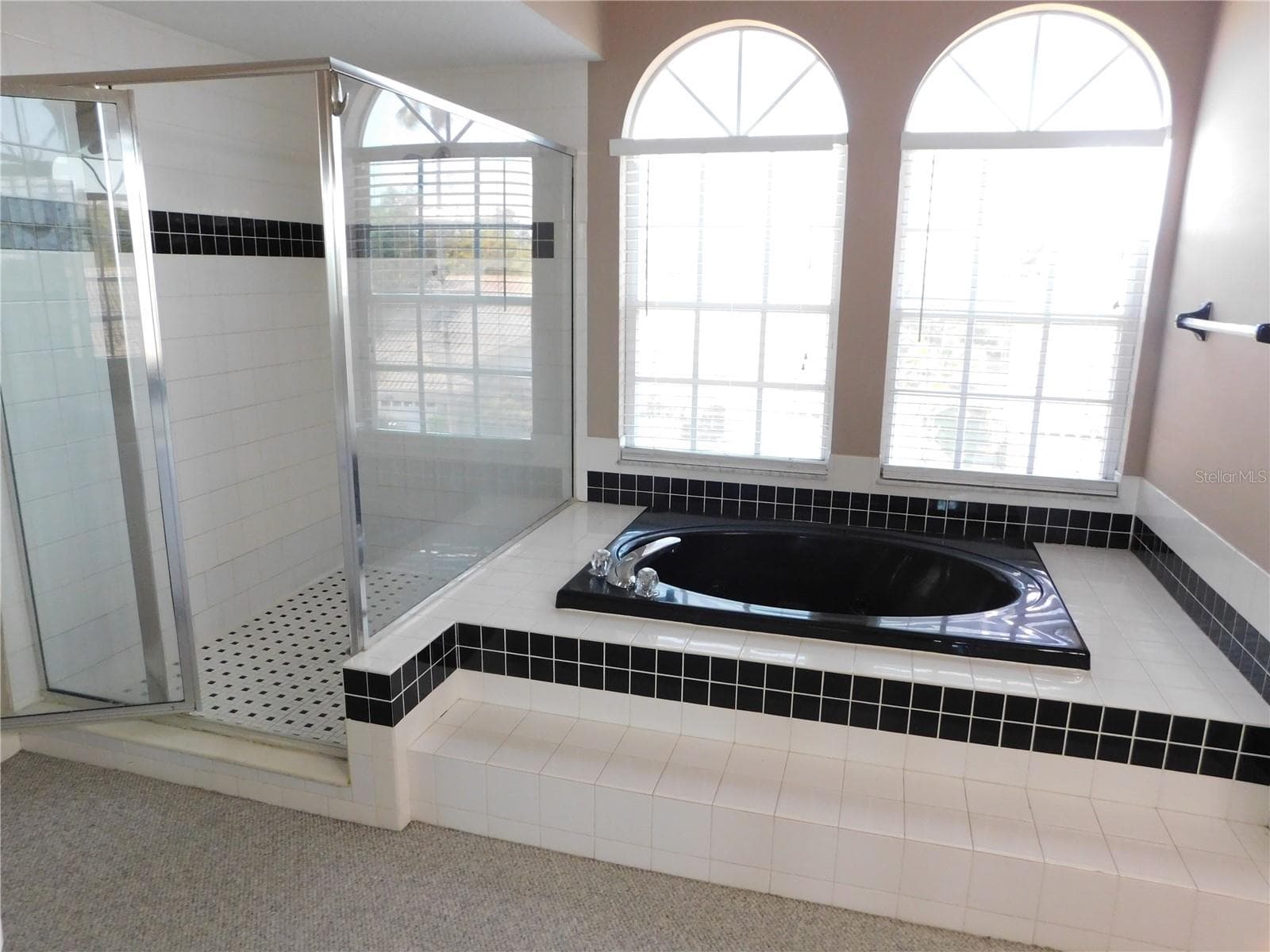 Primary bath has soaking tub and large shower - 1720 ARABIAN LN, PALM HARBOR