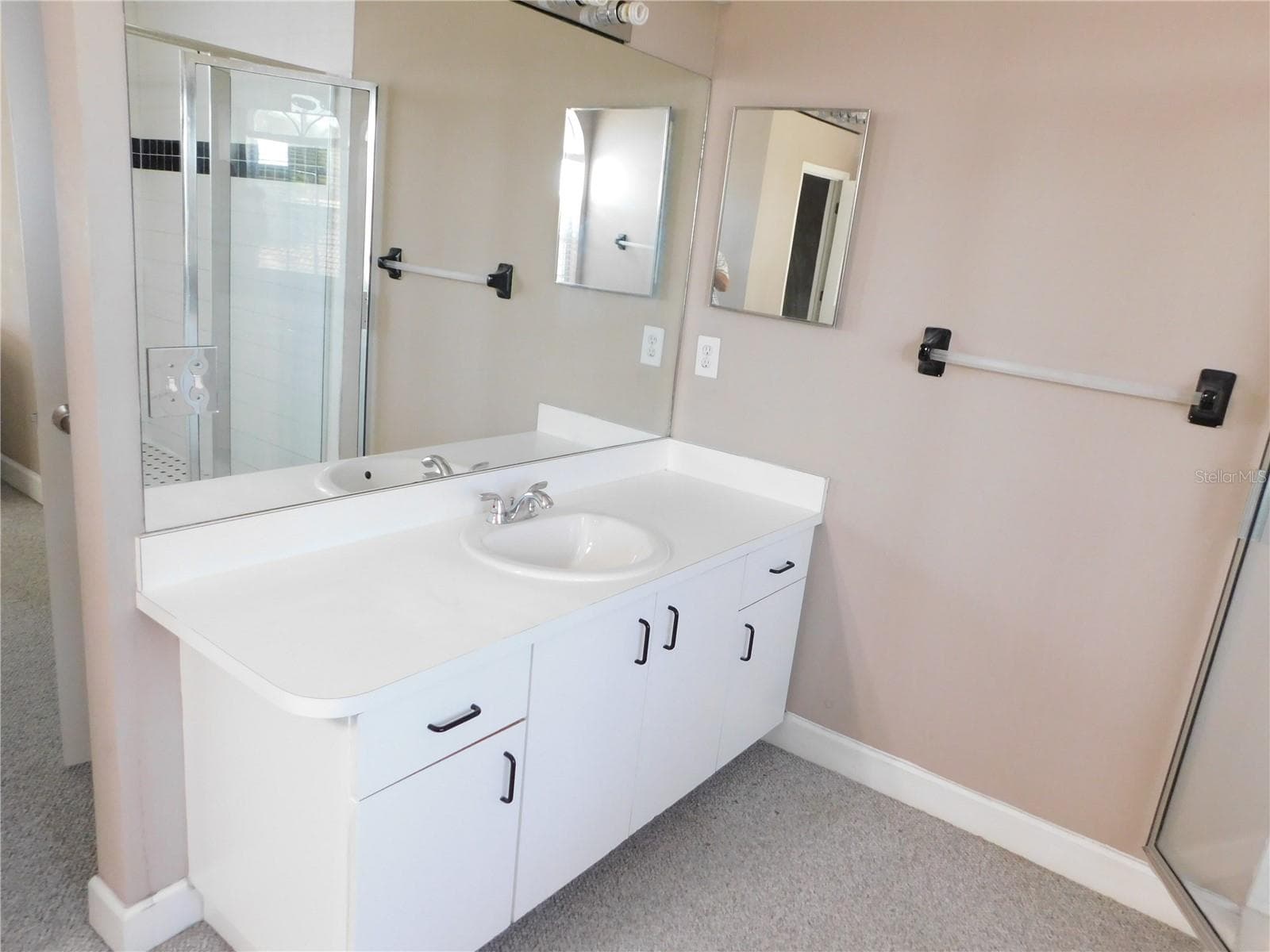 Separate vanities in Primary bath. This is one. - 1720 ARABIAN LN, PALM HARBOR