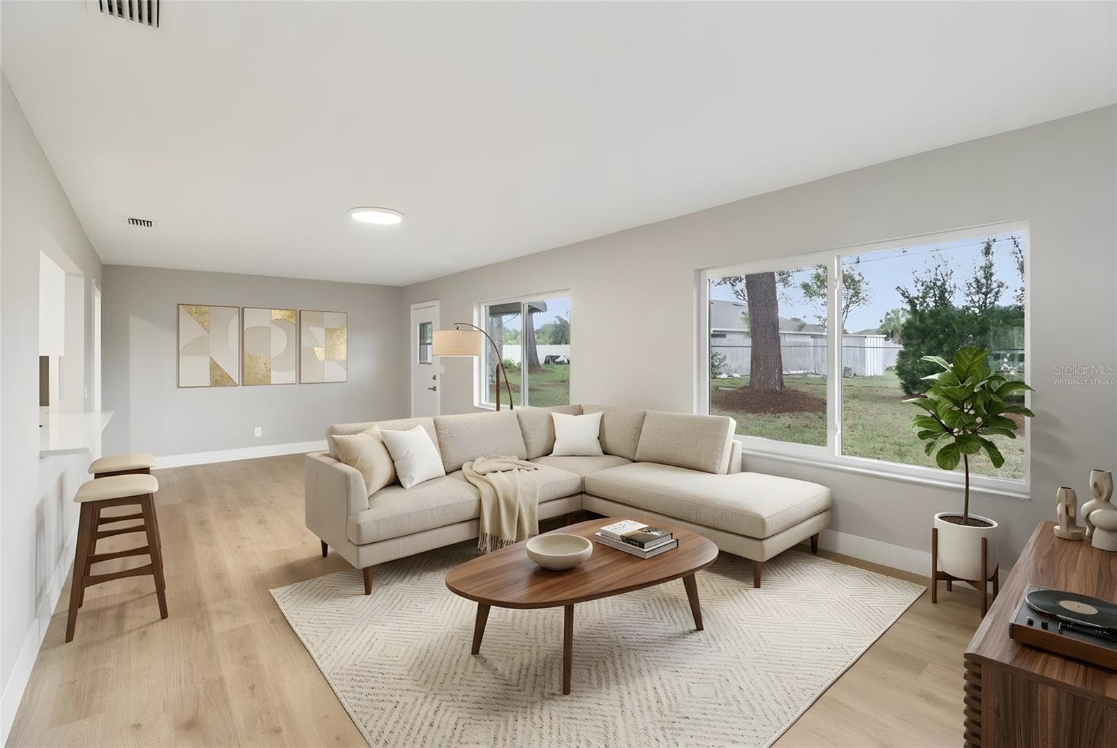 Family Room. Virtually Staged. - 1412 DIGARMO TER, DELTONA