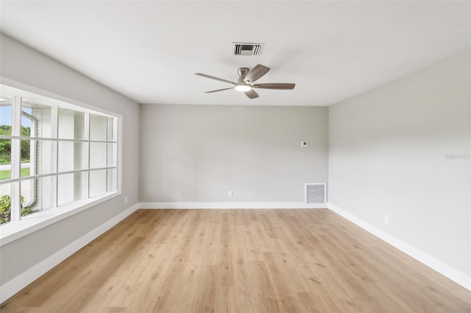 Living Room. - 1412 DIGARMO TER, DELTONA