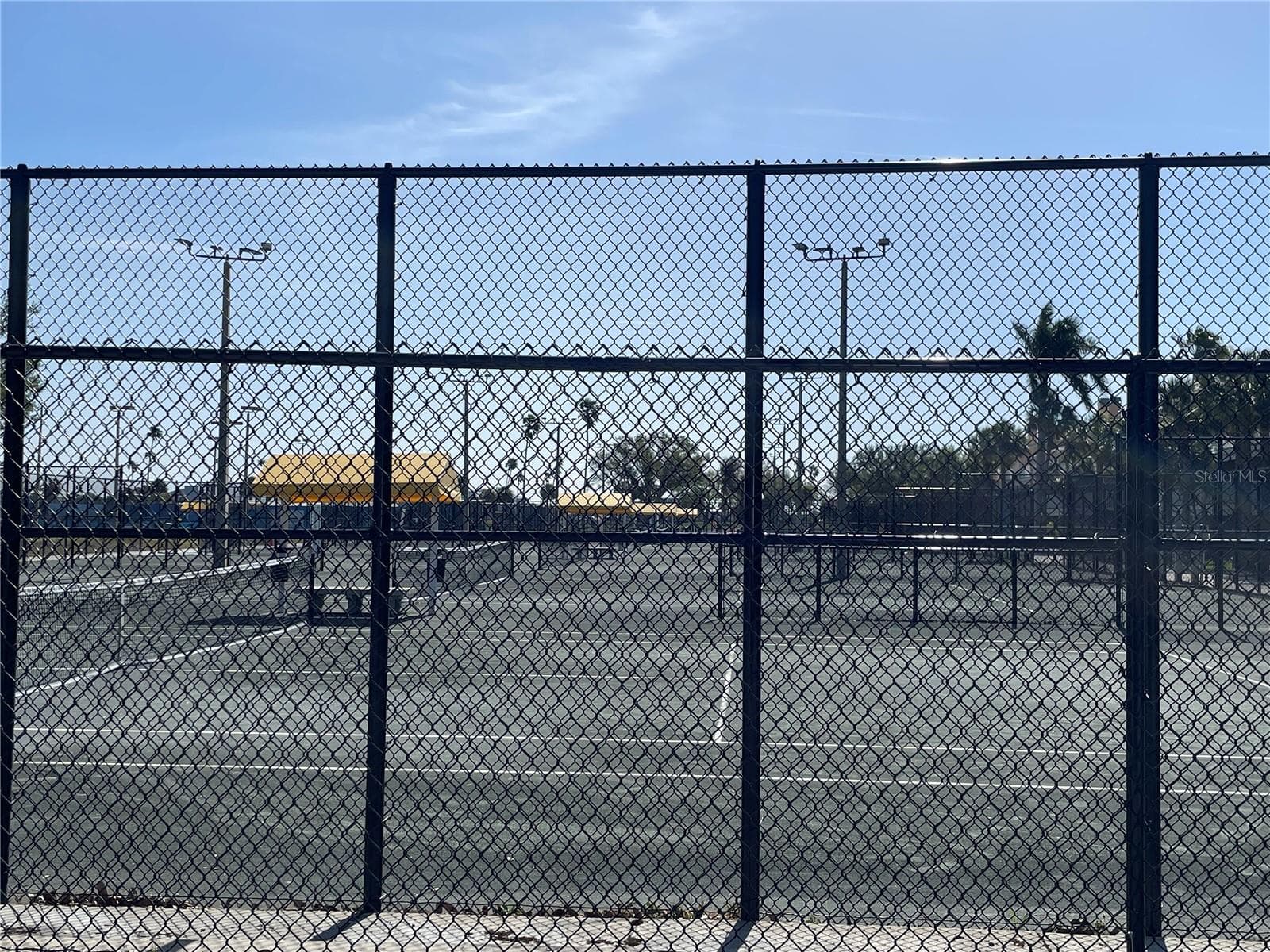 Tennis, pickelball and basketball courts at Treasure Bay. - 4 BELLEVUE DR, TREASURE ISLAND
