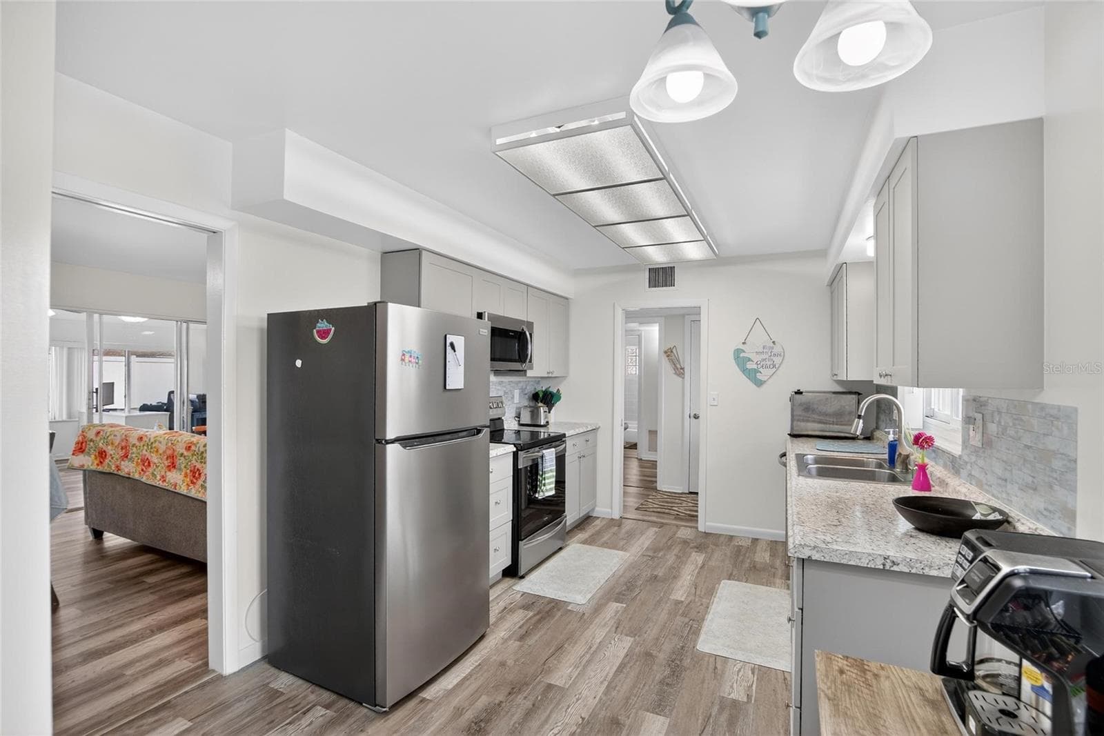 Kitchen is very good size with a closet pantry and room to eat-in - 809 OAKMONT AVE, SUN CITY CENTER