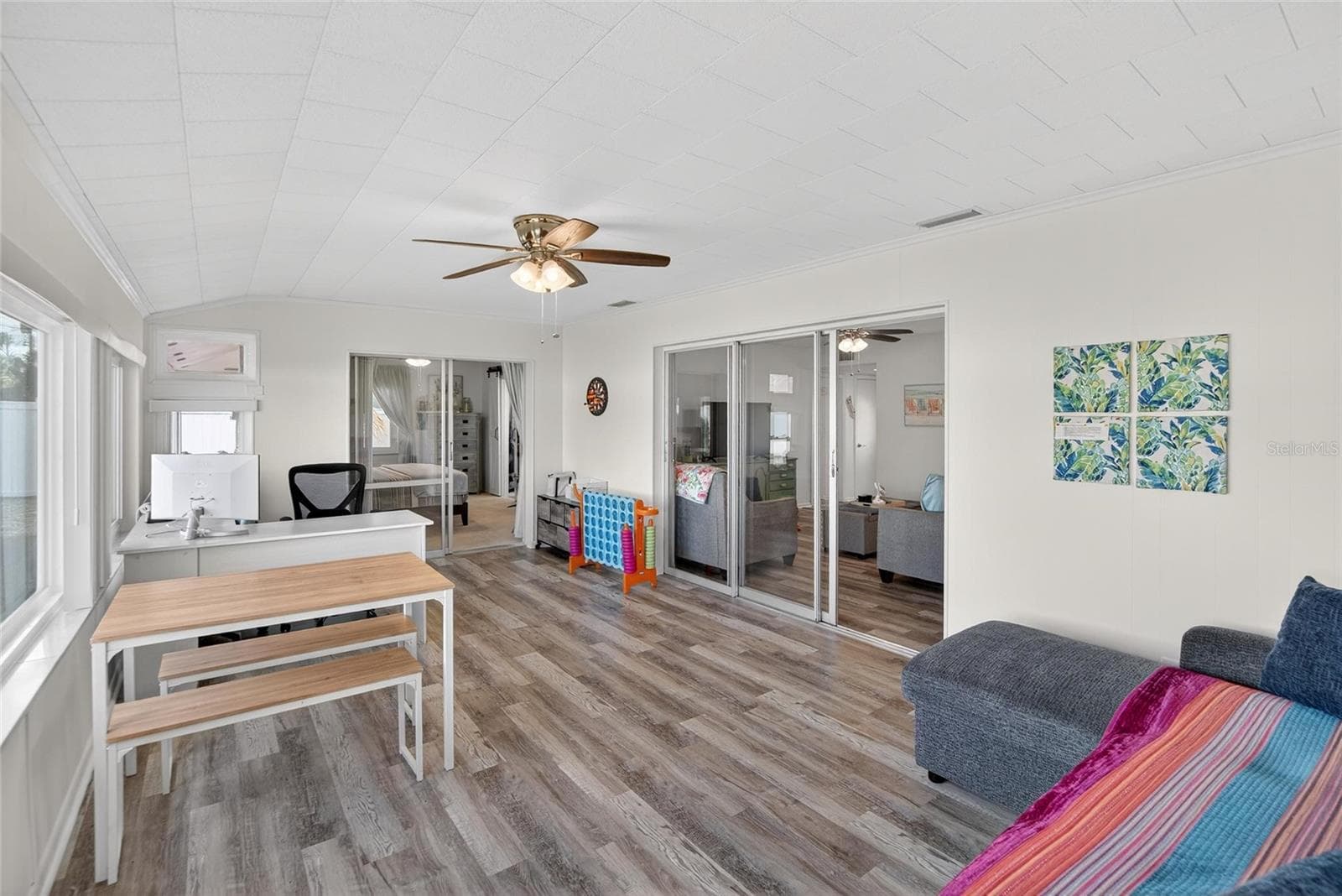 The Florida room is spectacular for enjoying all that Florida has to offer - 809 OAKMONT AVE, SUN CITY CENTER