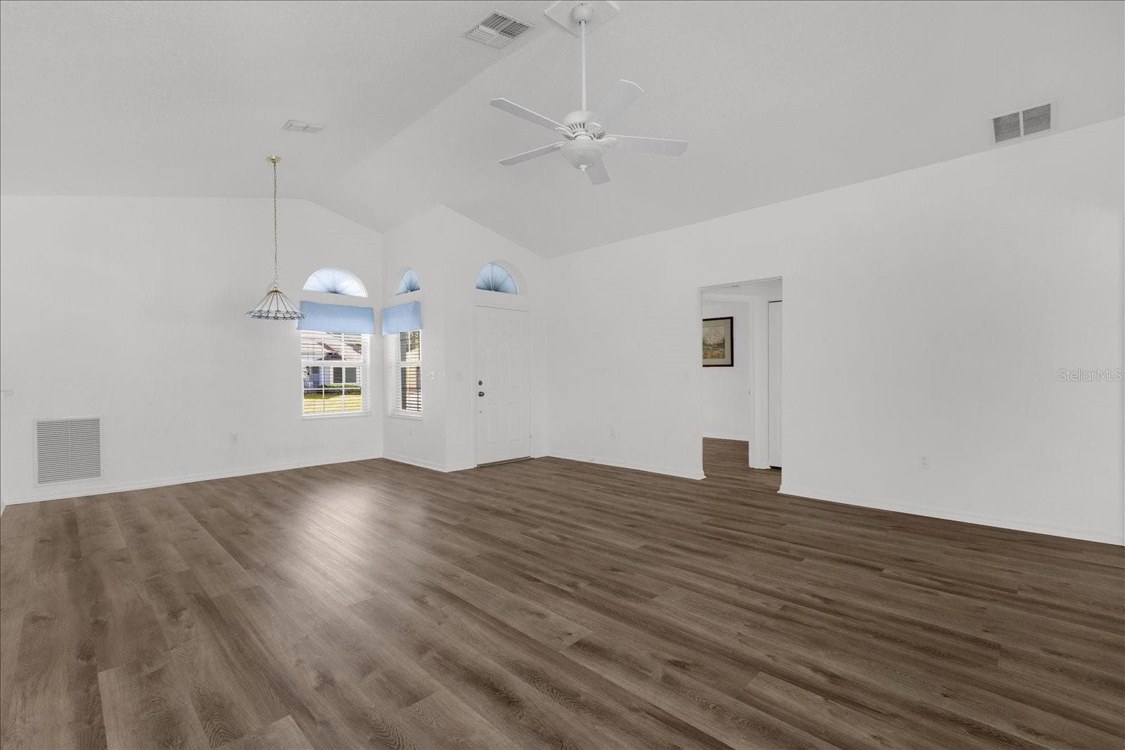 Large entertaining area - door to guest room and bath - 6359 SW 117TH LOOP, OCALA