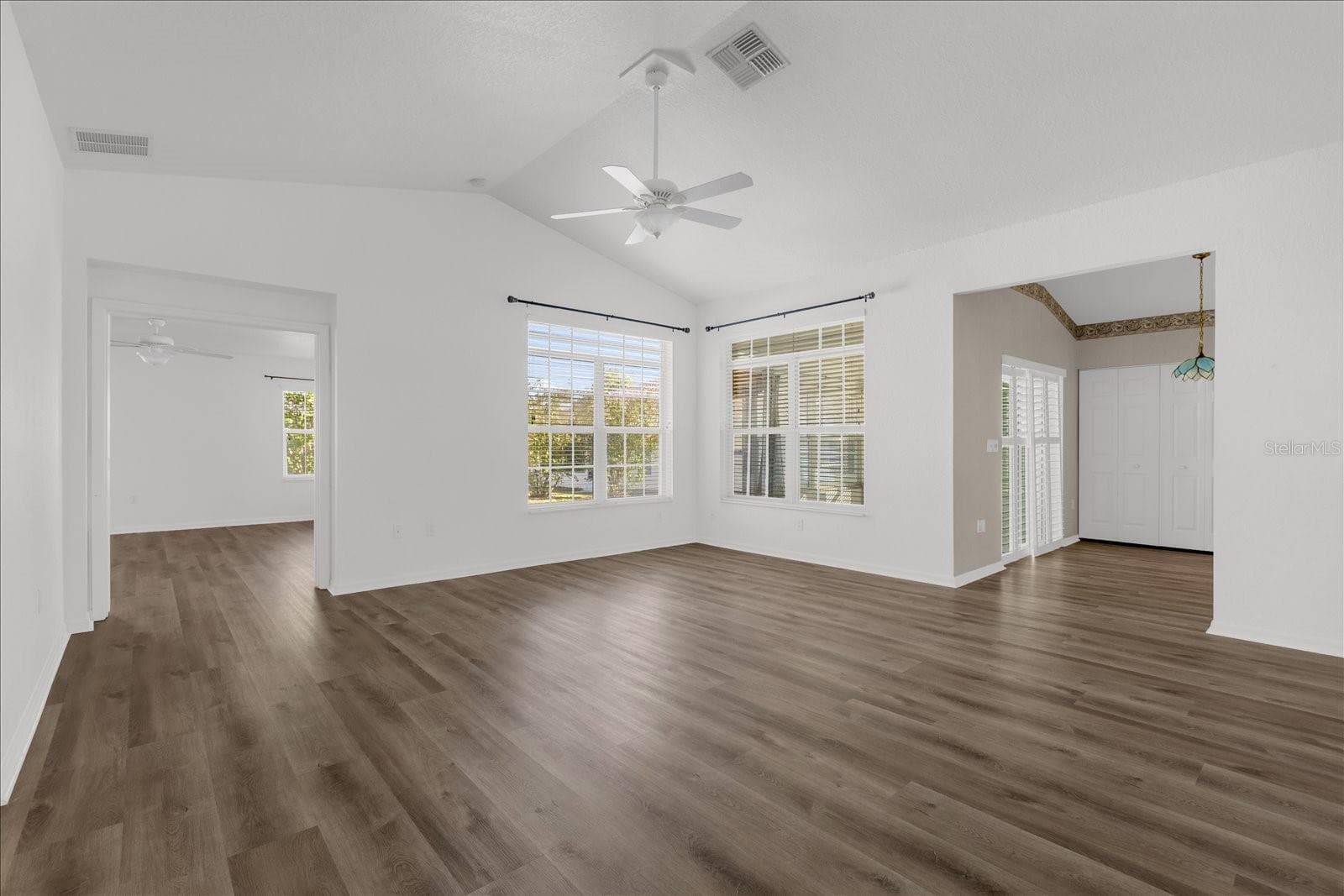 Living room - kitchen to right - master bedroom double door entry - 6359 SW 117TH LOOP, OCALA