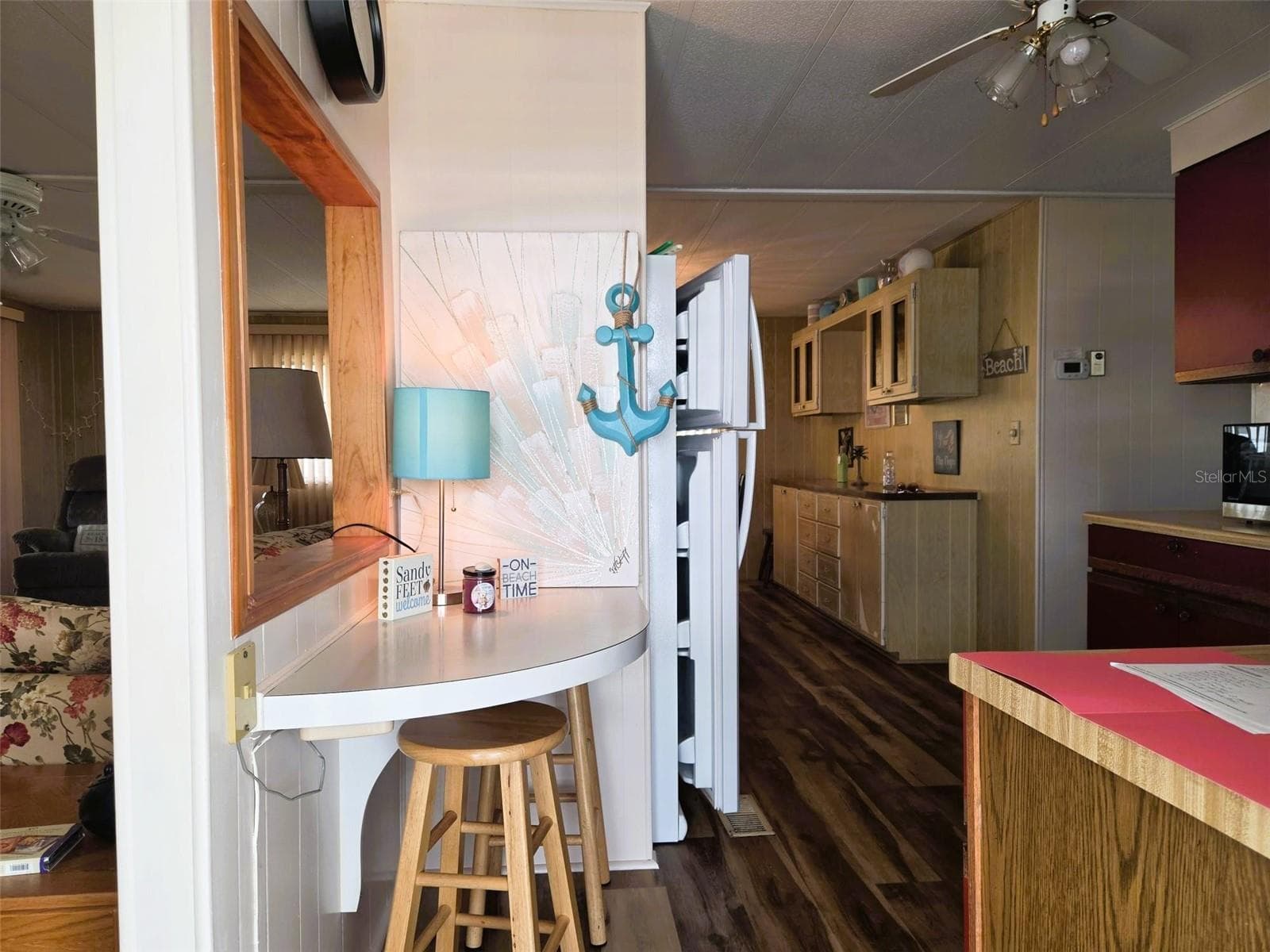 Entrance into the Kitchen Area with a small sitting area - 3226 SWEET GUM TER, SARASOTA
