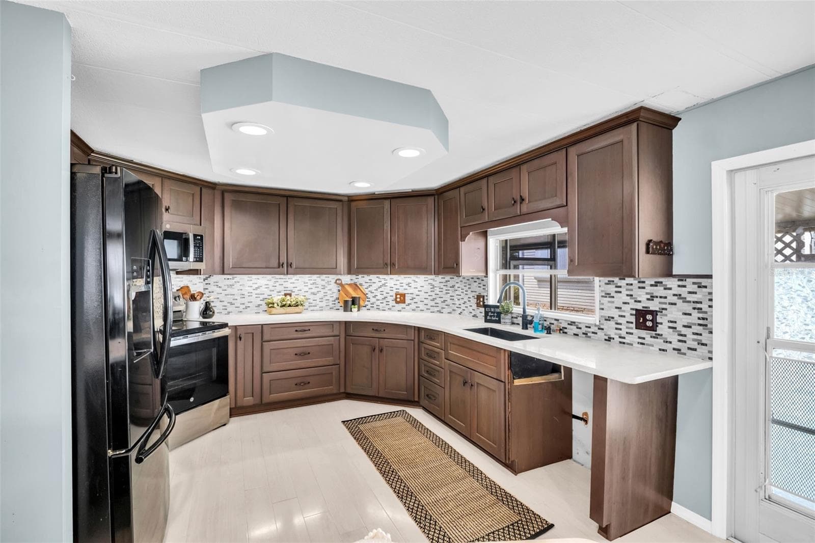 Manufactured Home at 23 MOUNTAIN LAUREL DR, PALM HARBOR, photo 7 of 66