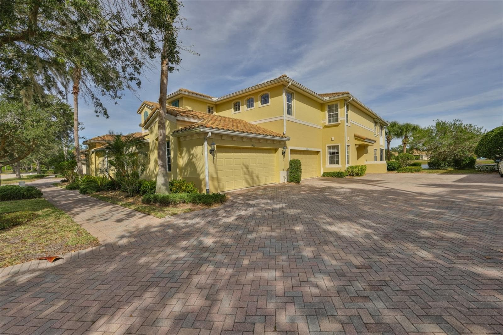 Tile roofs and paver drives - 1324 EMERALD DUNES DR, SUN CITY CENTER